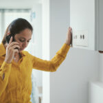 Woman calling a boiler breakdown service